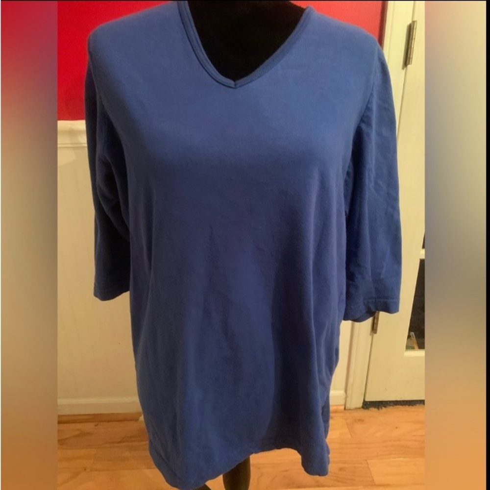 New in package royal blue tunic size M.